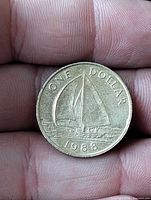 Reverse showing sailboat, denomination, year