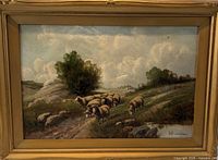 Framed oil painting showing full pastoral scene