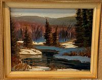 Front view of framed oil painting showing artwork, signature visible