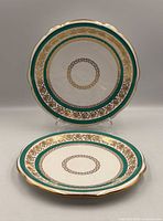 Two Davenport plates showing face and rim design