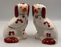 Front view of both ceramic spaniel figurines