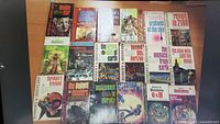 Grid of 20 Robert Heinlein science-fiction paperbacks