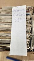 Box labelled Denmark Covers 325+ filled with envelopes