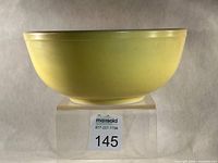 Side view of yellow Pyrex mixing bowl