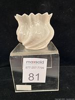 Front angled view of Belleek Neptune Shell vase showing overall form and condition