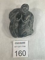 Front view of carved Sedna figure