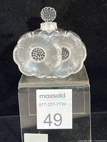 Front view showing double flower motif and stopper