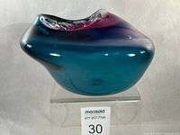 Front view showing asymmetrical form and colour gradient