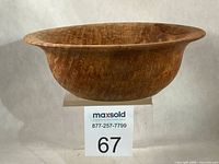 side profile of cedar bowl on display block