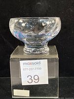 Three-quarter view showing overall form and swirl pattern