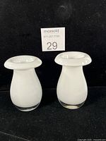 Front view of both white opaline mushroom vases
