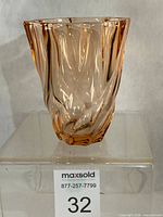 Front view of pink swirl optic vase