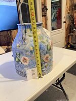 Full view of jug with tape measure showing height