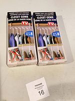 Front view of two sealed Closet Genie boxes