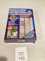 Front of boxed Magnetic Mesh hands-free screen door
