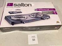 Front of box showing Salton portable cooktop