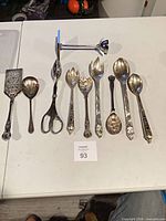 All nine serving pieces laid out on table