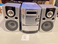 Front view of complete Sony stereo system with both speakers and main unit