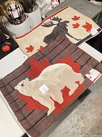 Two Stepguard floor mats displayed on table