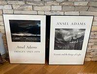 Both framed Ansel Adams posters side by side