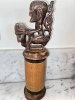 Full view of bamboo container with carved stopper