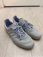 Top view of Adidas Samba sneakers showing color, laces, toe condition, gum soles