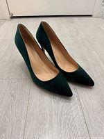 Both pumps angled front view showing uppers and toes