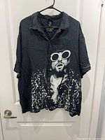 Front of Kurt Cobain graphic shirt on hanger