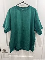Front view of green H&M heavy cotton t-shirt