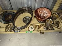 Shelf view of mixed metal items