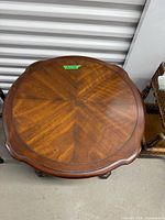 Top view showing walnut veneer starburst pattern