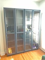 Front view of two blue IKEA Billy bookcases side by side