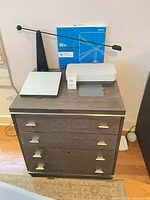 Overall view of chest with printer, antenna, base, and box