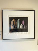 Framed print on wall showing full artwork and frame