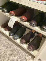 Shelved view of three pairs on two levels