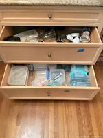 overview of three drawers containing the mixed lot