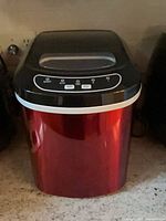 Front view of red Northair countertop ice maker