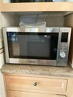 Front view of Panasonic NN-CD87KS microwave on countertop