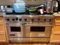 Front view of Viking 8-burner stainless steel range with double ovens