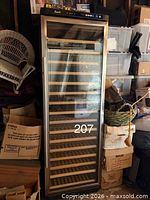 Full front view of Avanti wine refrigerator, door closed