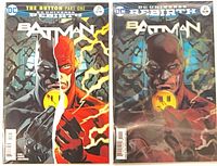 Both comic issues bagged side by side showing A and B covers