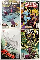 Group shot showing all four bagged and boarded Marvel comics