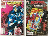 Front covers of both comic annuals in sleeves