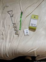 Grinder, collar and anchor laid out