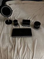 entire set arranged on surface showing mirror, tray, tumbler, holder, jar
