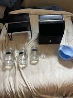 Overview of all items: shelf, bread box, three jars, plastic bowl