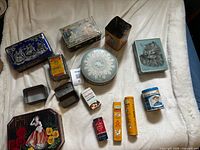 Group shot of all tins showing variety and condition