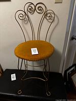 Full view of vanity stool showing frame and seat