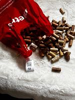 Bag and pile of mixed wine corks