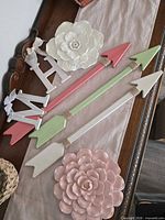 Set showing all three arrows, two flower plaques, and letters M & H